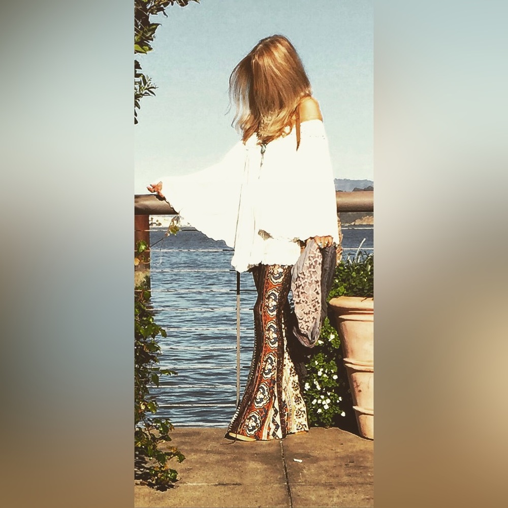 By FREE PEOPLE . It’s TTS . Worn a few times.